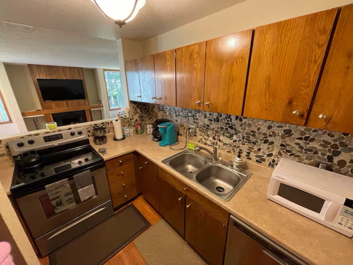 Kitchen before — oak cabinets